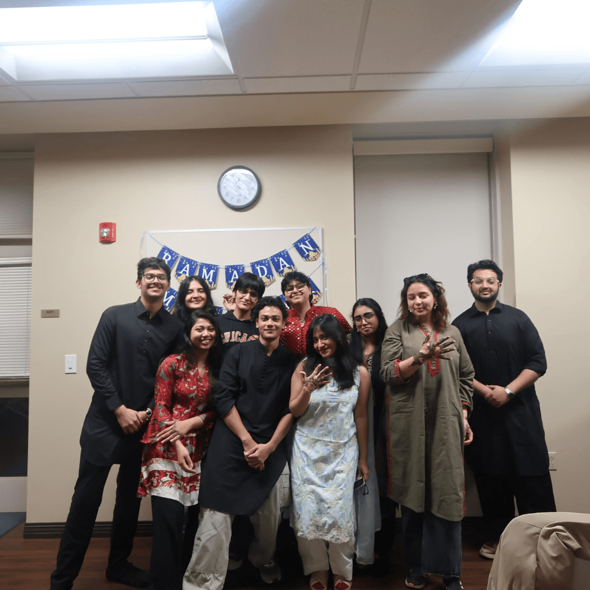 Students posing for a photo during a Ramadan celebration.